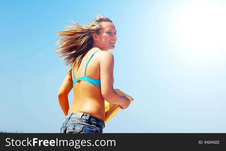 Young attractive woman enjoying summertime. Young attractive woman enjoying summertime