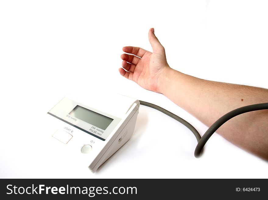 Blood pressure monitor at white background