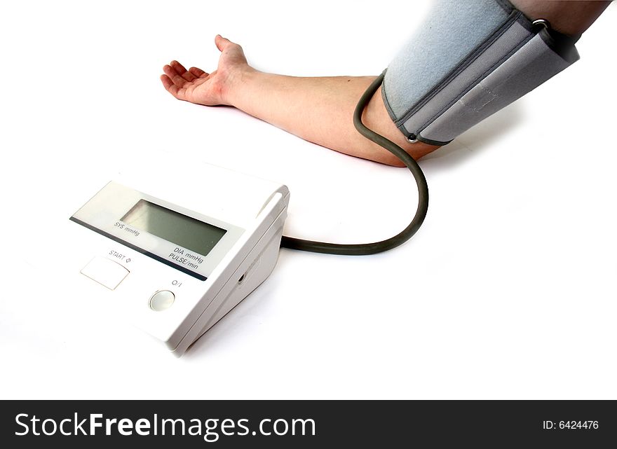 Blood pressure monitor at white background