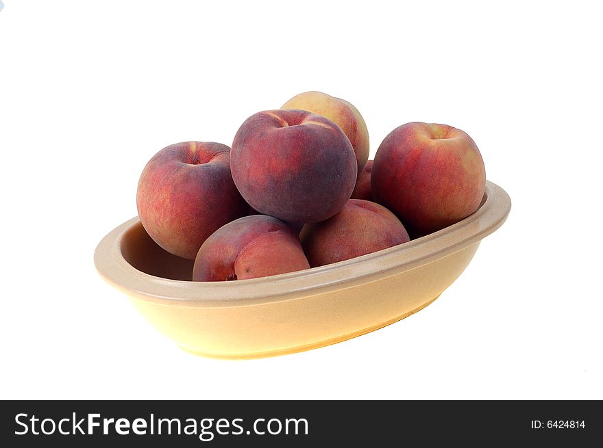 Fresh peaches on white background