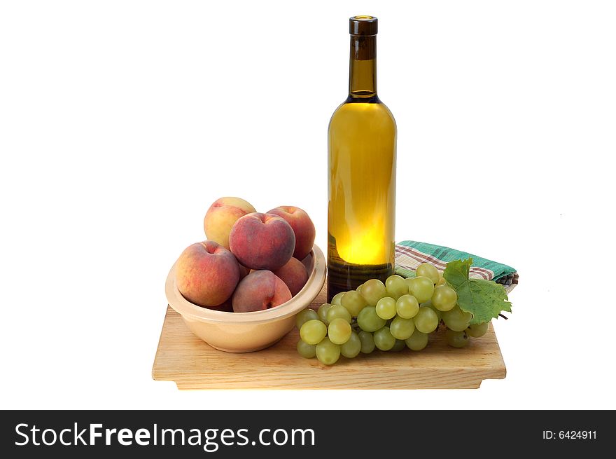 Bottle of vine and some fruits