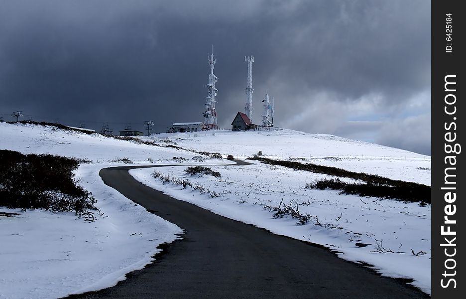 Top of a mountain with a sky cablecar and radio transmitters. Top of a mountain with a sky cablecar and radio transmitters