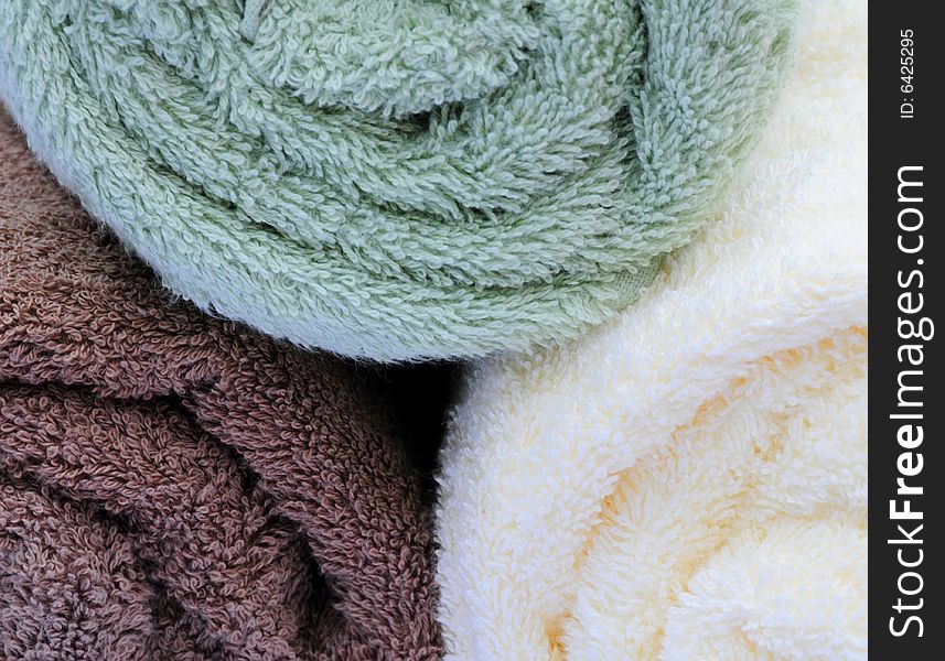 Three rolled up towels,an ideal background. Three rolled up towels,an ideal background