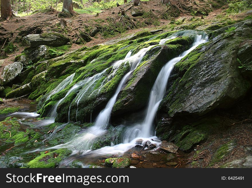 A little waterfall on Lisci stream in czech mountains