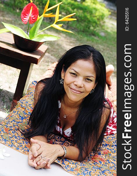 Beautiful Thai woman relaxing at a day spa.