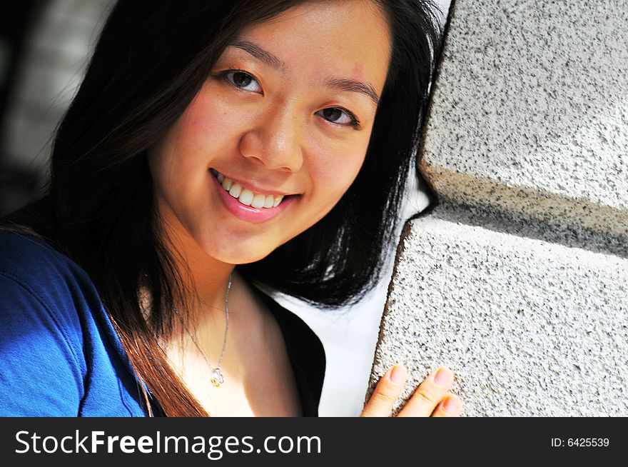 Picture of an Asian Girl with office landscape behind. Suitable for contexts of office environment, casual staff, part-timers, and even interns. Picture of an Asian Girl with office landscape behind. Suitable for contexts of office environment, casual staff, part-timers, and even interns.