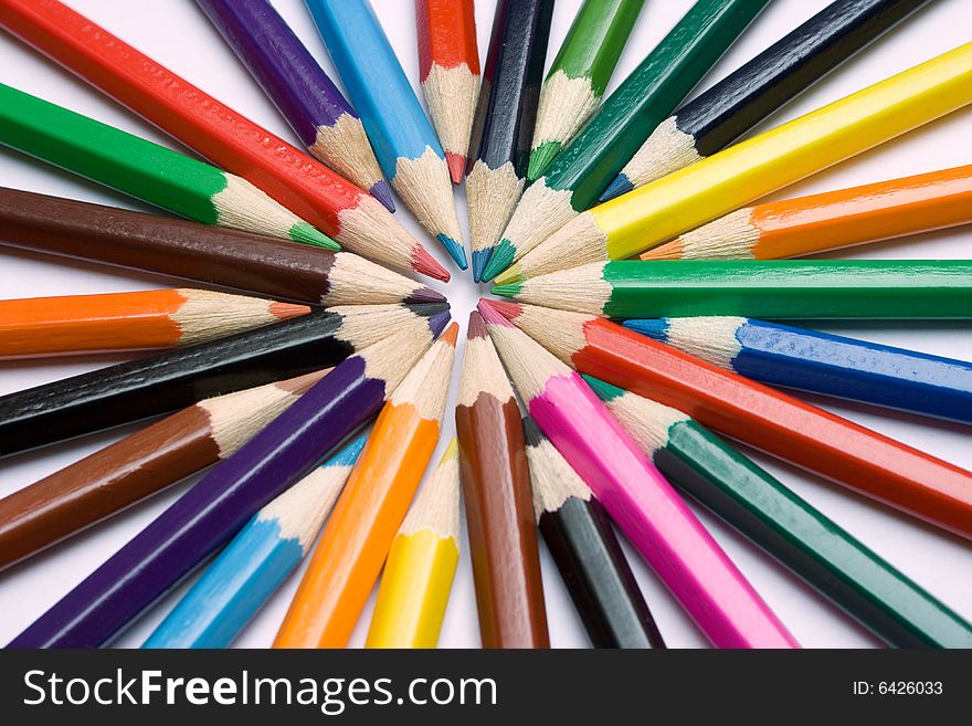 Many colored pencils in circle