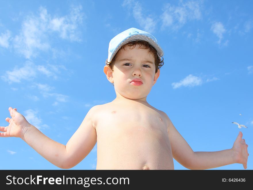 3 year old boy against the sky. 3 year old boy against the sky