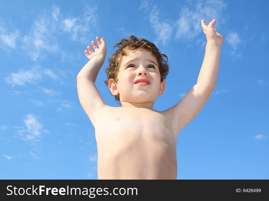 3 year old boy against the sky. 3 year old boy against the sky