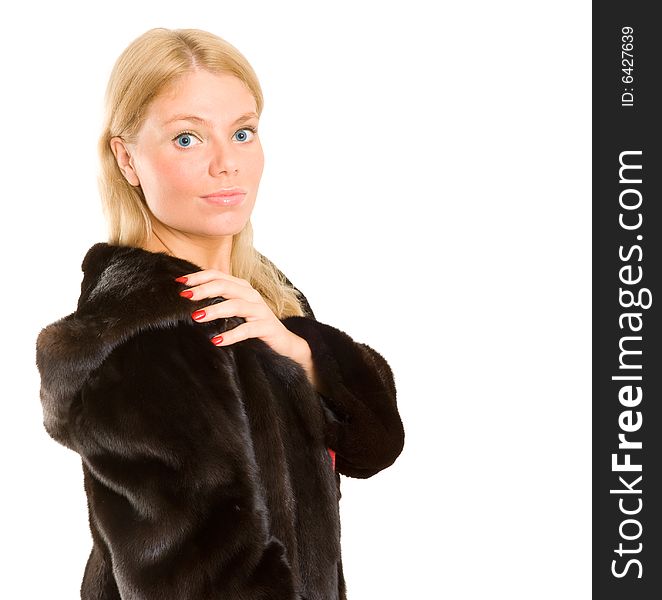 Sexy young woman over white background in fashion fur
advertising. Sexy young woman over white background in fashion fur
advertising