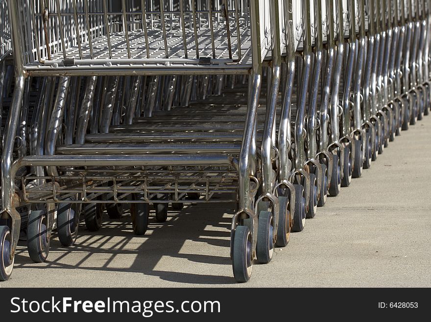 Stack Of Empty Shopping Carts. Wheels.