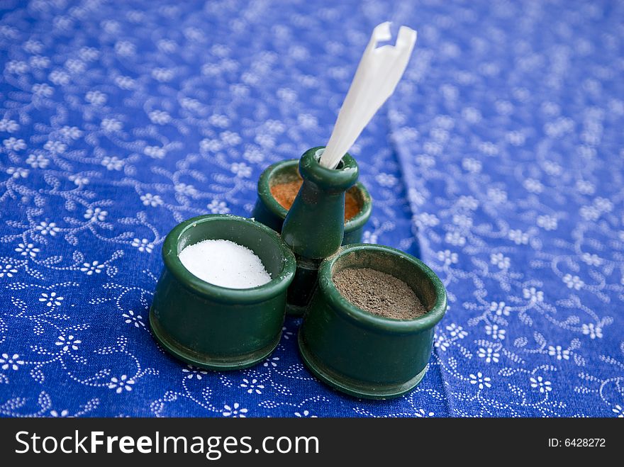 Closeup of dish for salt, peeper and paprika on table. Closeup of dish for salt, peeper and paprika on table