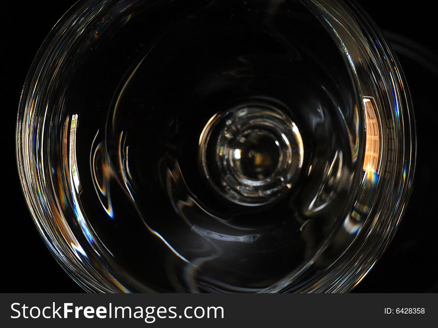 A series of photographs taken of a sherry glass.