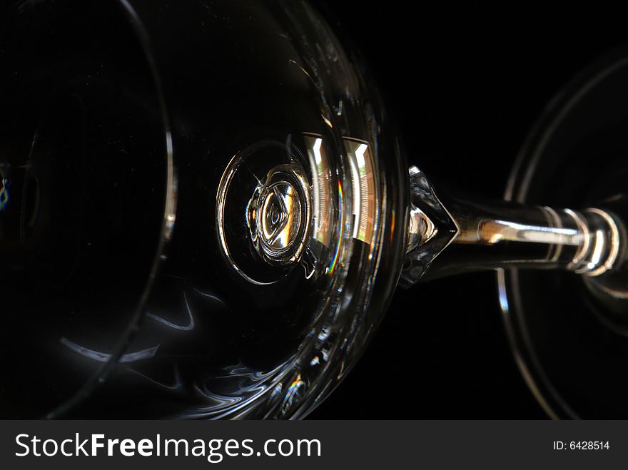 A series of photographs taken of a sherry glass.