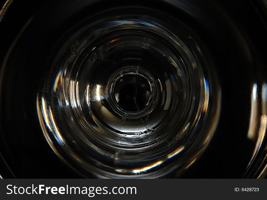 A series of photographs taken of a sherry glass.