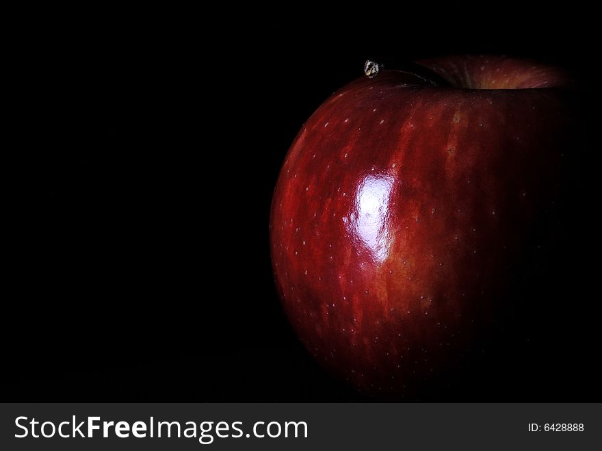 A series of photographs of a red apple.