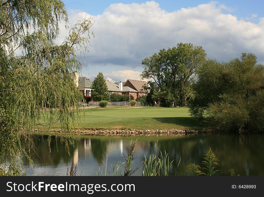 A scenic golf course community and pond