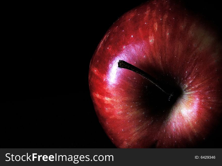 A series of photographs of a red apple.