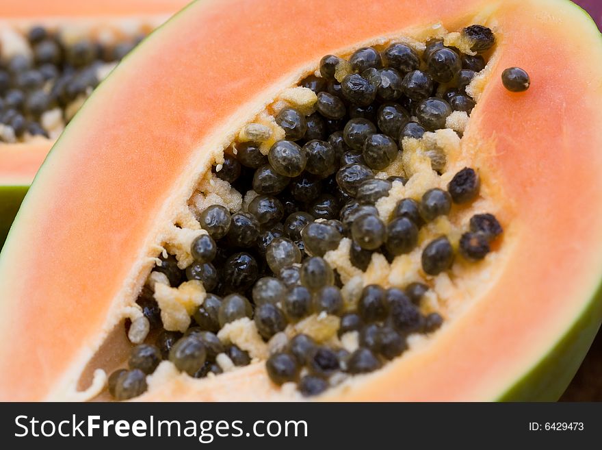 Close up of a juicy papaya with seeds