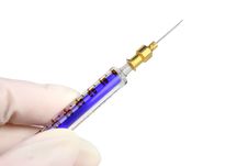 Hand With Syringe (clipping Path) Royalty Free Stock Images