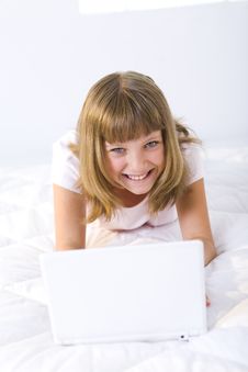 Happy Girl With Laptop Royalty Free Stock Images