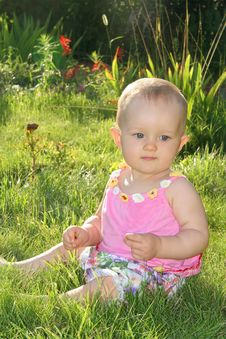 Baby Girl Sitting On The Grass Stock Photo Baby Girl Sitting On The Grass Stock Photo