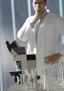 Young Scientist Thinking In His Lab Stock Photography Young Scientist Thinking In His Lab Stock Photography