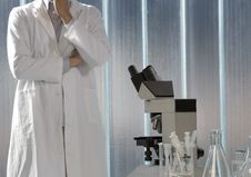 Young Scientist Thinking In His Lab Stock Photo