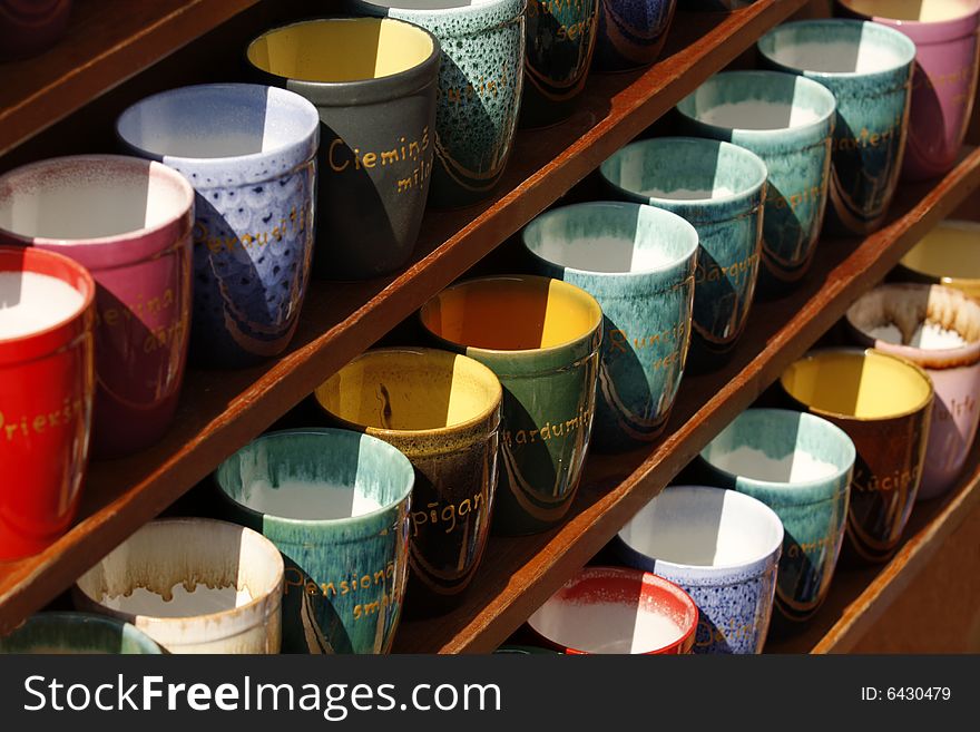 Pyramid of bright cups , background