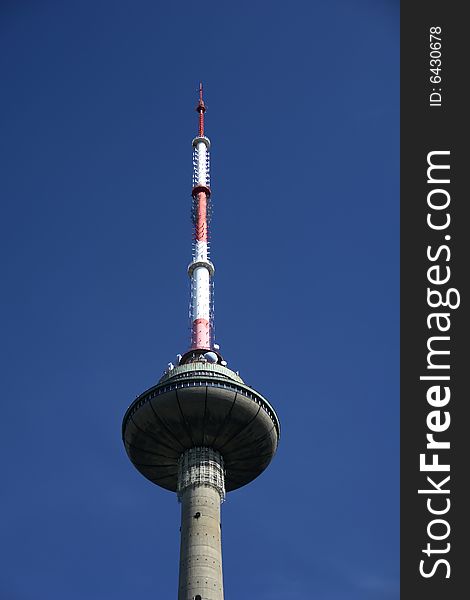 Vilnius Television Tower isolated over a blue sky background