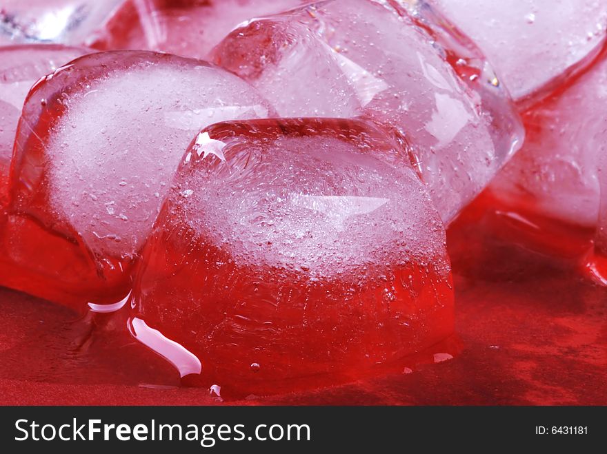 Ice cubes in red background. Ice cubes in red background