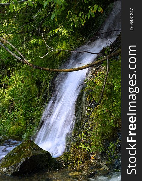 Woodâ€™s waterfall with clean water.