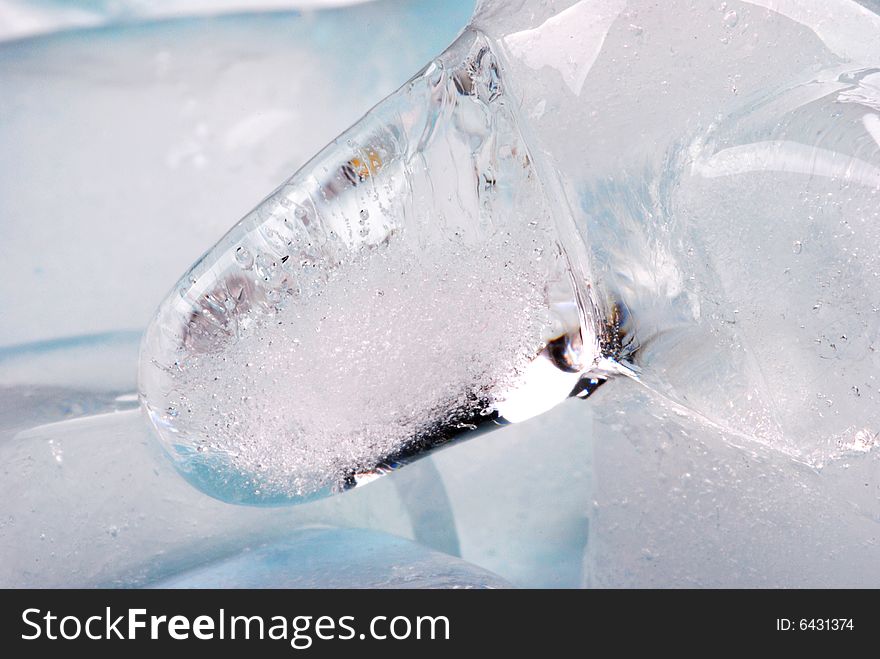 Ice cubes in blue background. Ice cubes in blue background