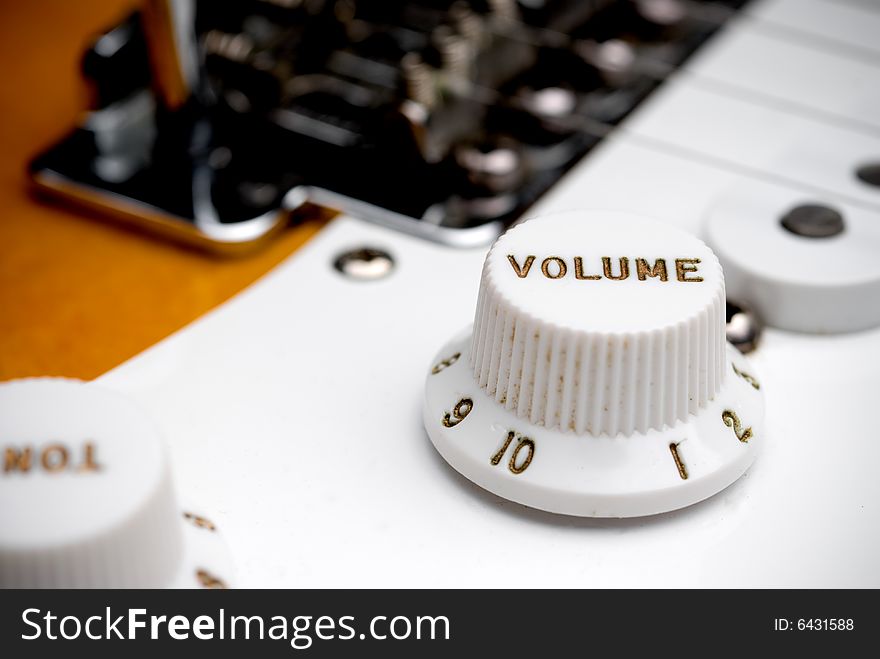 Closeup of a guitar volume control knob