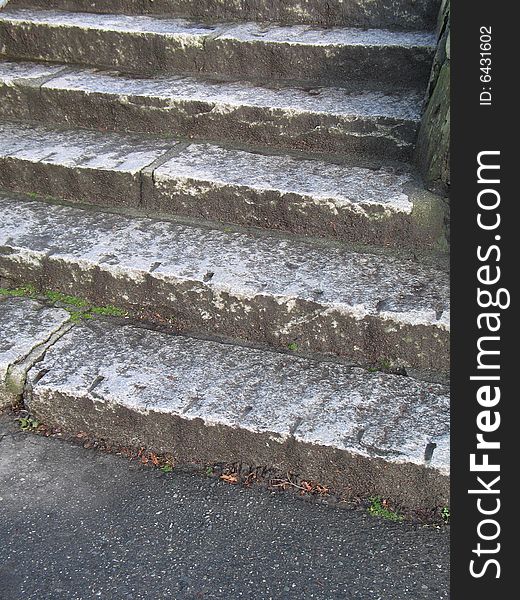 Old dark outdoor stone steps