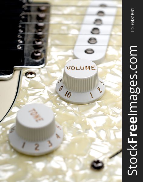 Closeup of a guitar volume control knob