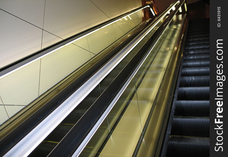 Black modern escalator in a modern building