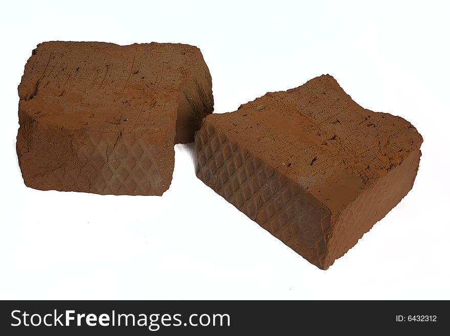 Brocken red brick on a white background is isolated