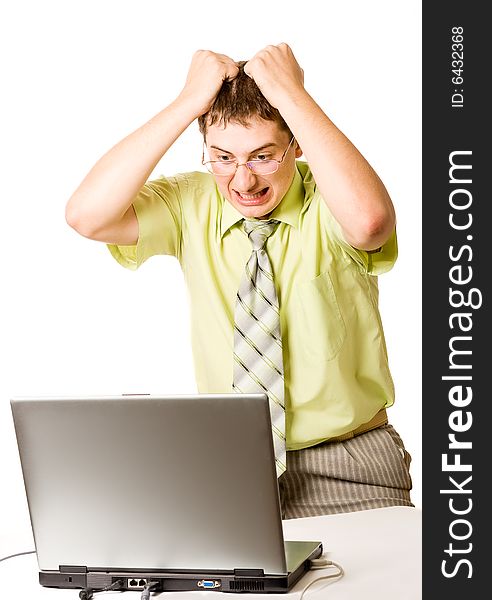 Shocked businessman holding his hair, white background