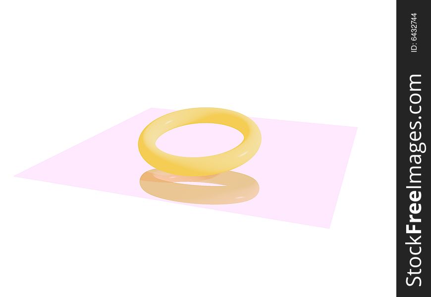 The image that contain a golden ring that shine and hanging on the flat mirror. The image that contain a golden ring that shine and hanging on the flat mirror