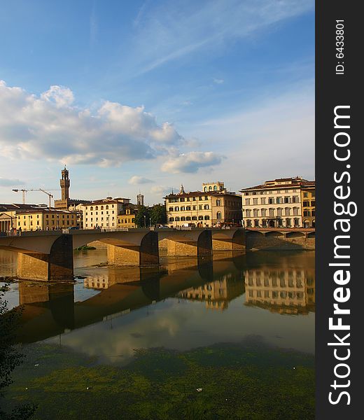 A wonderful landscape of Arno river, bridge and monuments in Florence