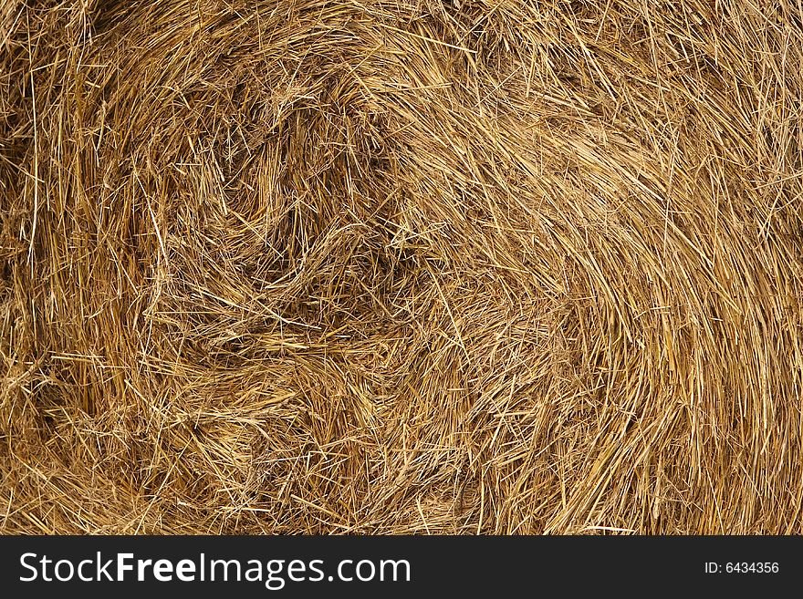 A golden dry straw background