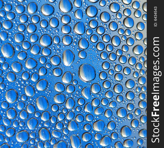 Natural blue water drops background
