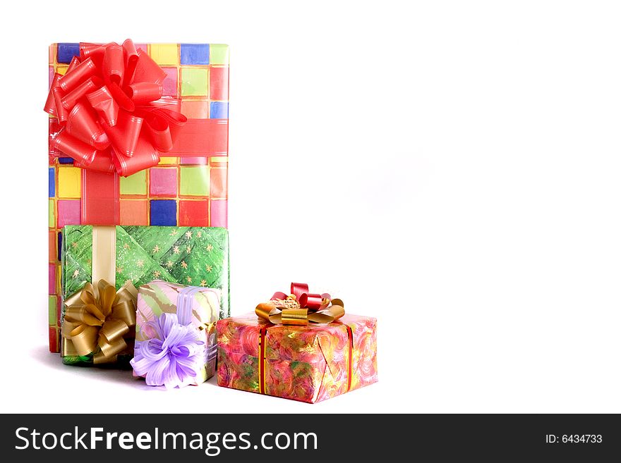Colorful presents close-up isolated on white background