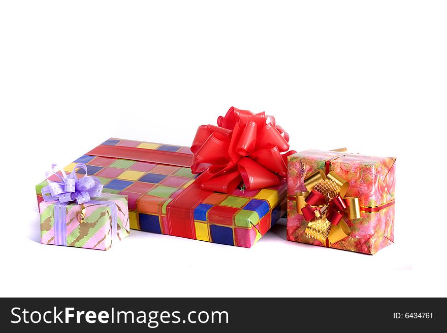Colorful presents close-up isolated on white background