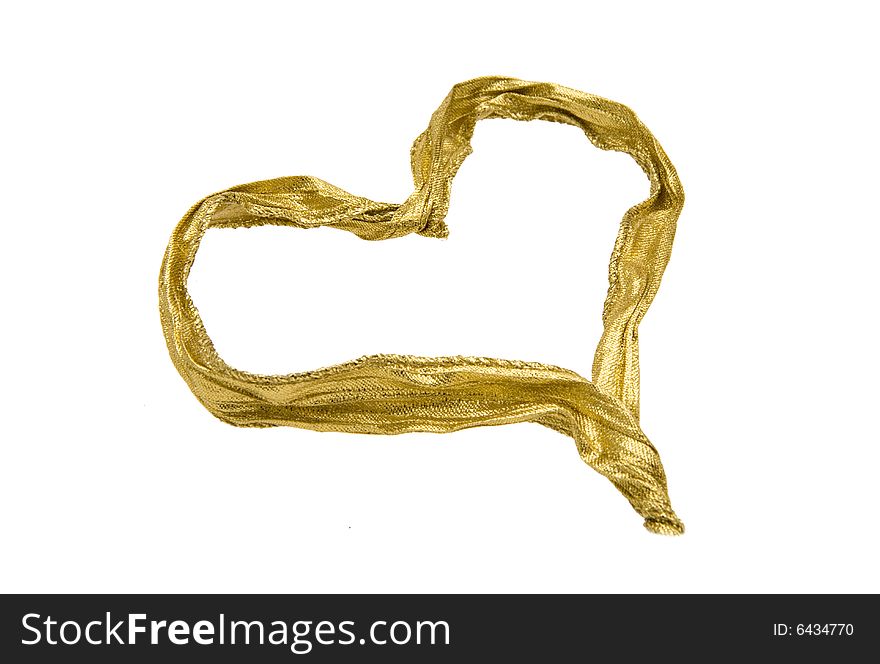 A golden ribbon shaped as a heart isolated on white. Useful for christmas or valentines themes. A golden ribbon shaped as a heart isolated on white. Useful for christmas or valentines themes.