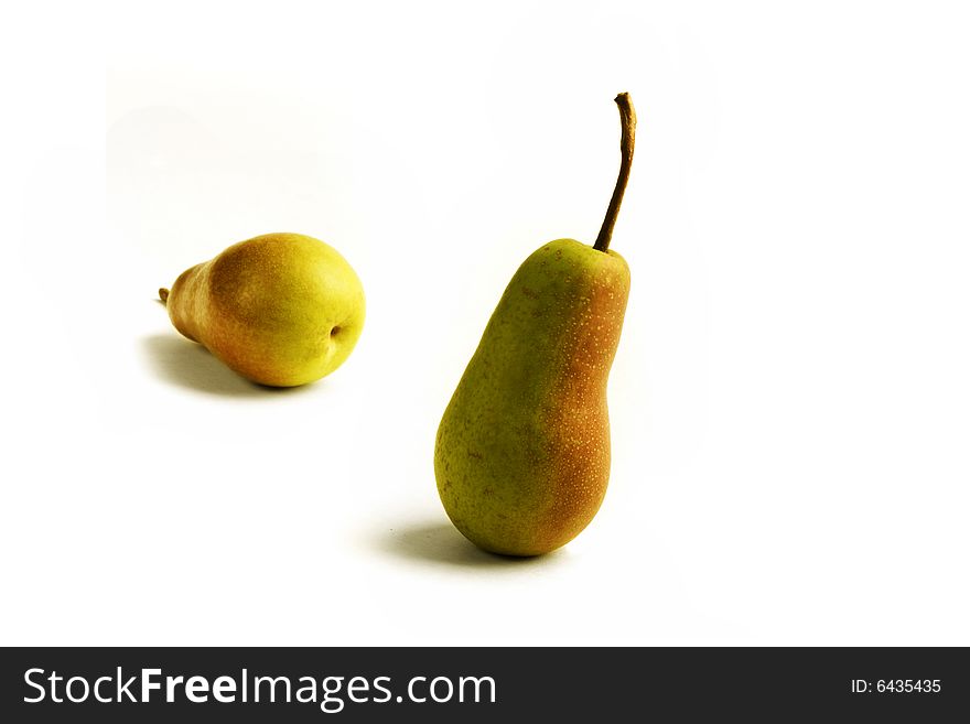 Two appetizing pears close-up isolated on white background
