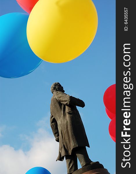 Monument for Lenin surrounded with bright colorful balloons. Monument for Lenin surrounded with bright colorful balloons