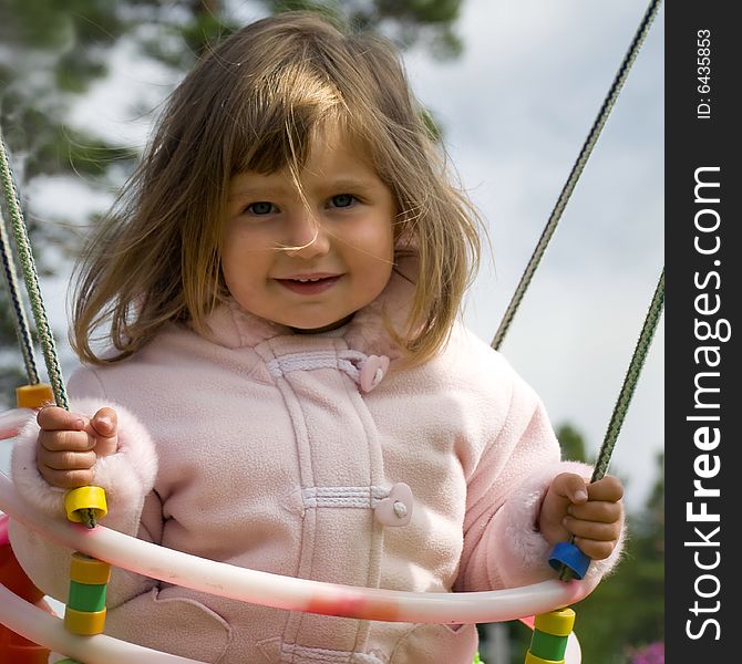 Girl on swing