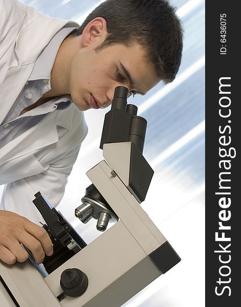 Scientist using a microscope, chemistry related or medical design. Scientist using a microscope, chemistry related or medical design